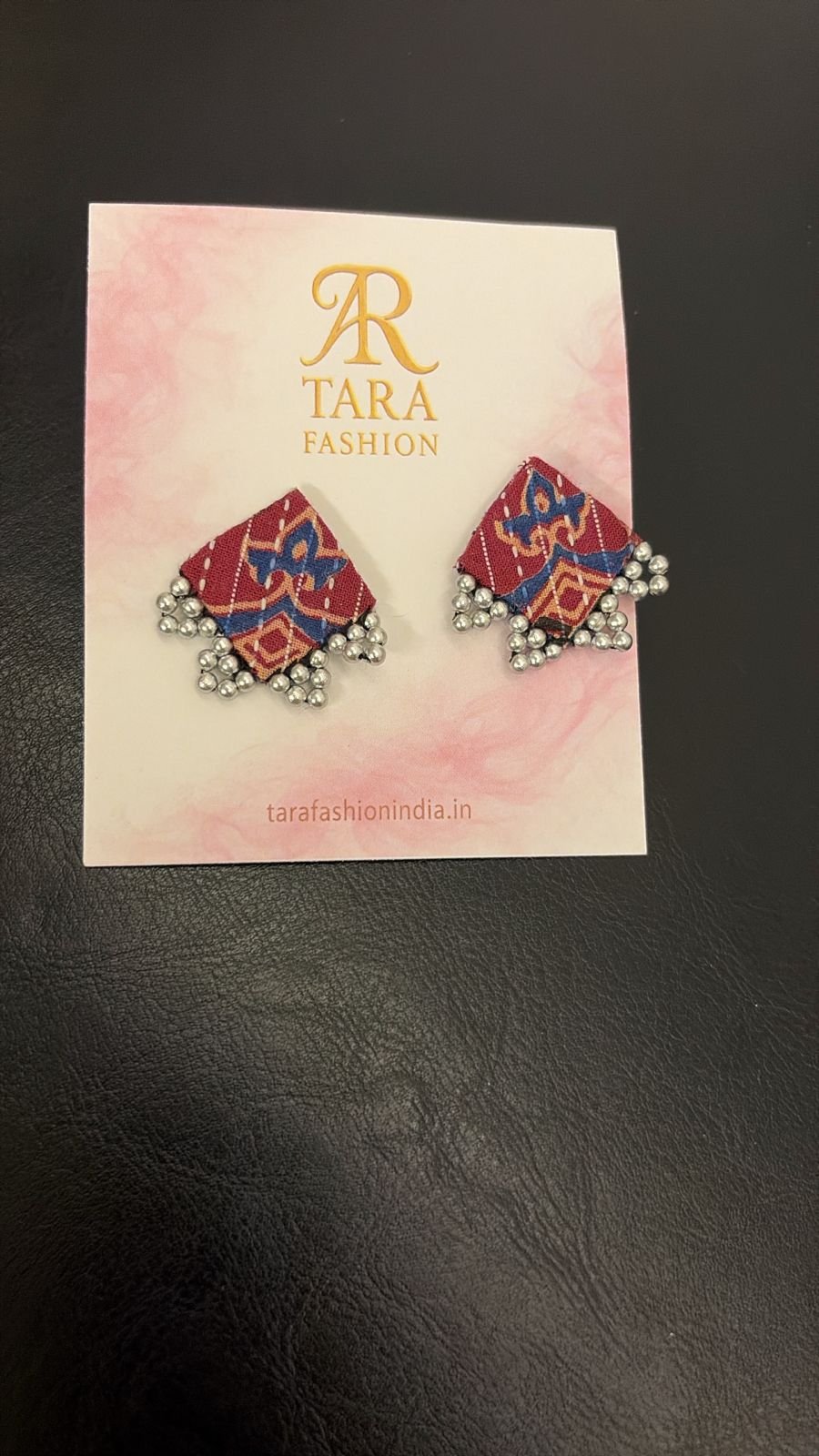 Quirky Ikkat Print Fabric Square Studs with Oxidized Ghungroo Borders